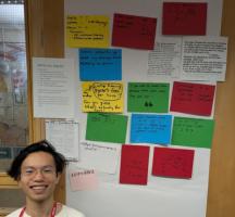 Jeff smiling at the camera next to a wall covered in quotes. One reads: "We're having goose's feet for lunch!" Can you guess what's actually for lunch?